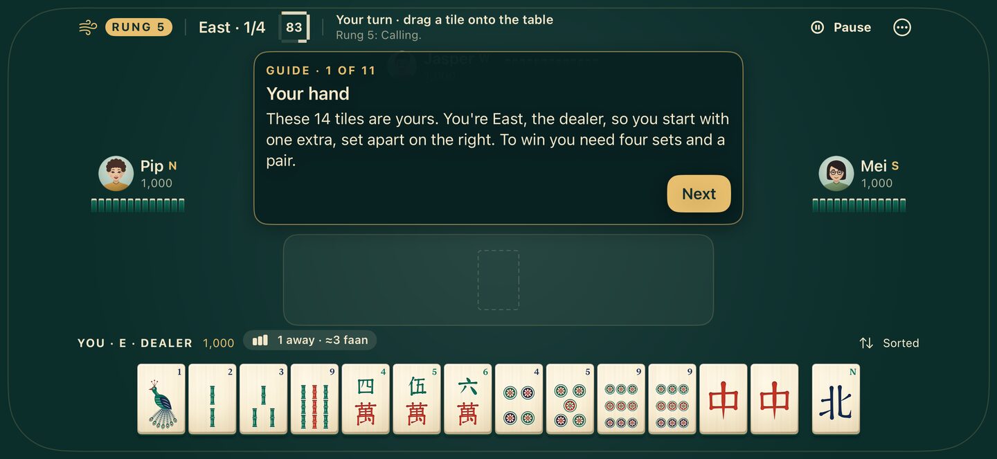 The guided Calling lesson on iPhone explains your hand, with a Next button and the tiles laid out below.